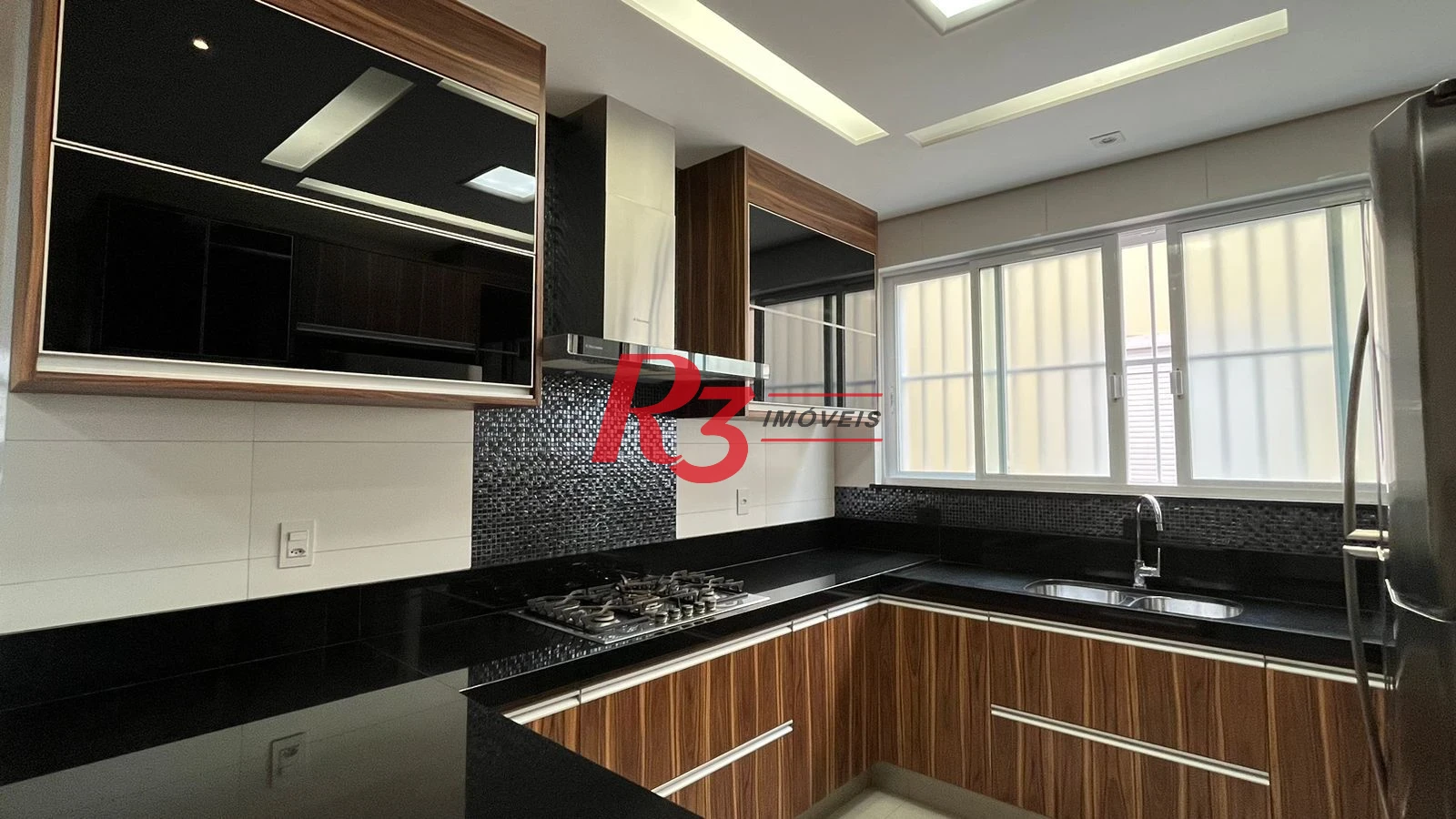 Casa com 4 dormitórios à venda, 370 m² por R$ 2.800.000,00 - Ponta da Praia - Santos/SP