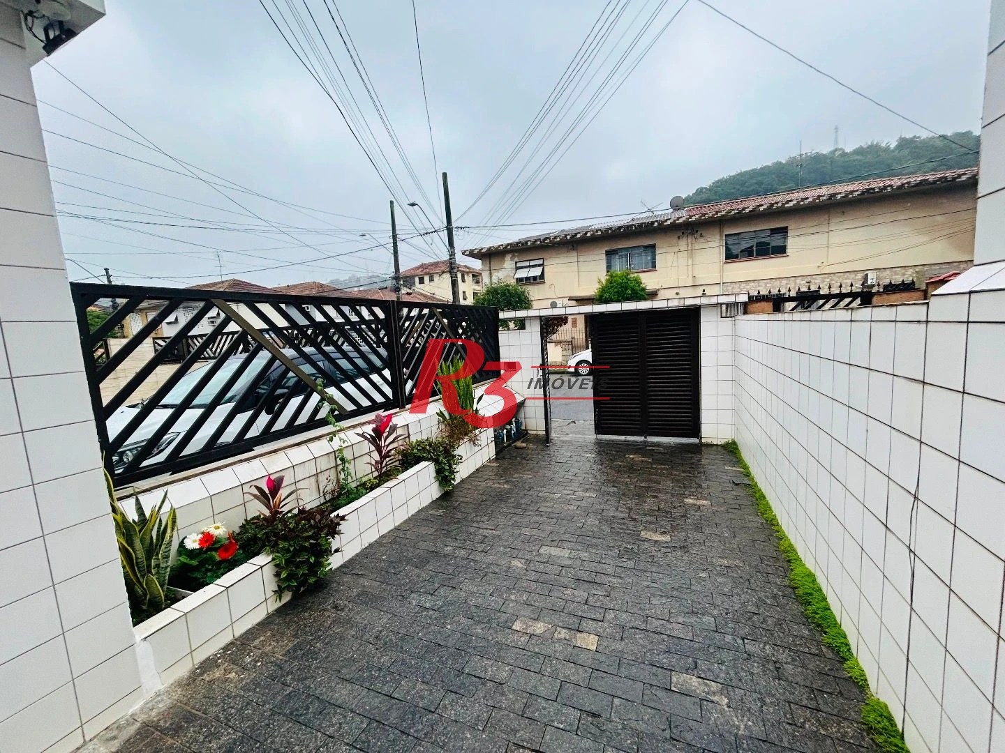 Sobrado com 2 dormitórios à venda, 86 m² por R$ 475.000,00 - Vila Matias - Santos/SP