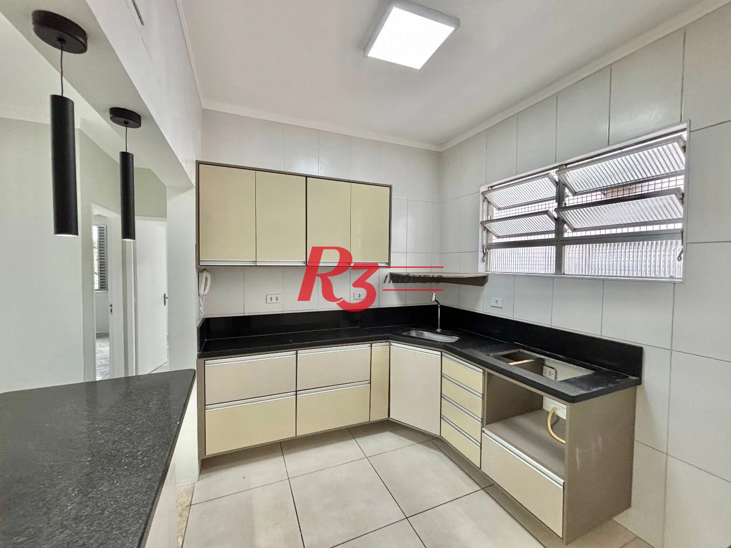 Apartamento com 2 dormitórios à venda, 54 m² por R$ 300.000,00 - Aparecida - Santos/SP
