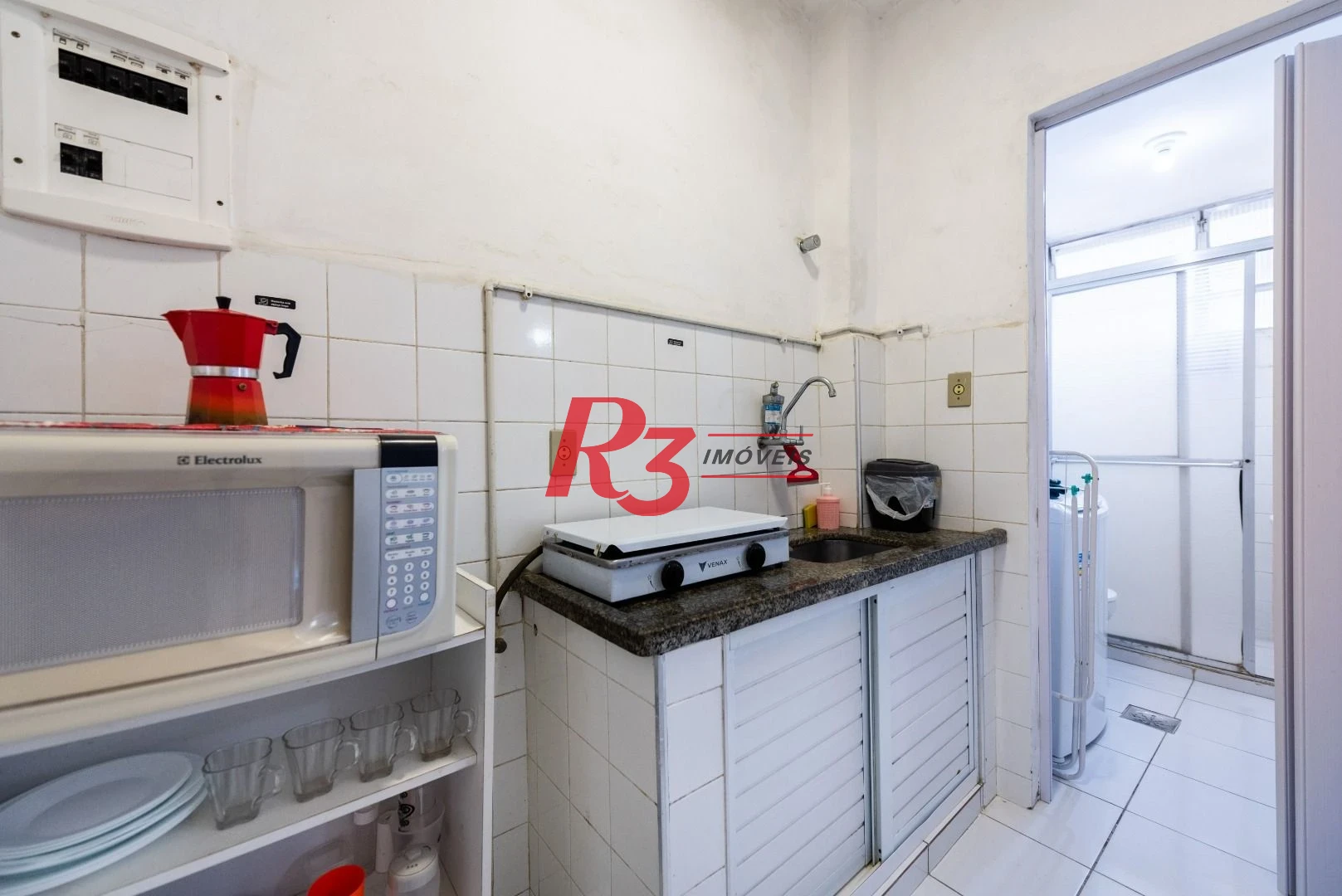 Kitnet com 1 dormitório para alugar, 31 m² por R$ 3.000,00/mês - Embaré - Santos/SP