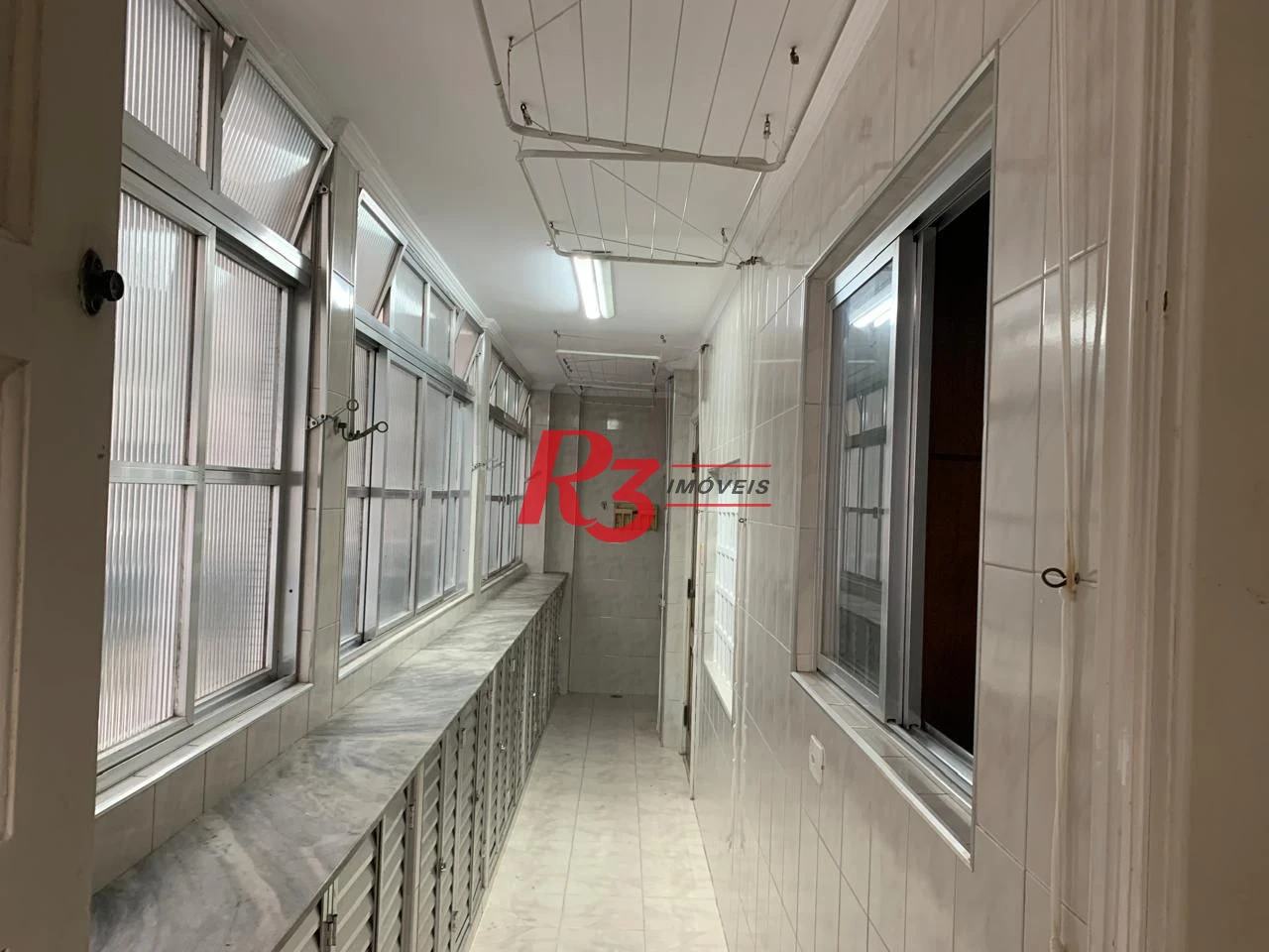 Apartamento com 3 dormitórios à venda, 257 m² por R$ 1.200.000,00 - Gonzaga - Santos/SP