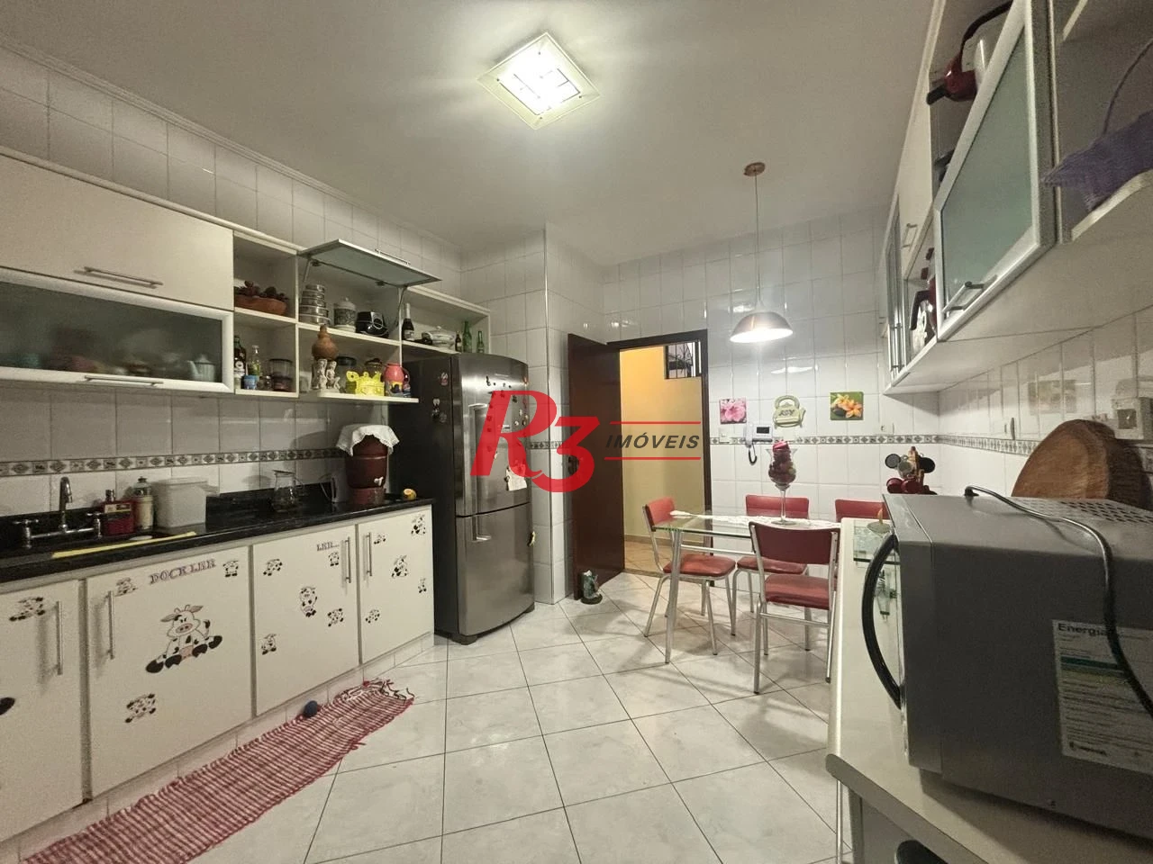 Casa com 3 dormitórios à venda, 127 m² por R$ 890.000,00 - Aparecida - Santos/SP