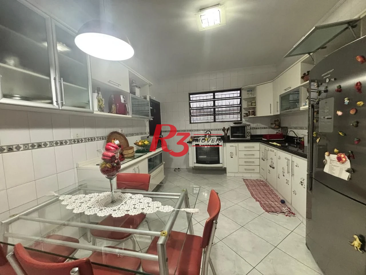 Casa com 3 dormitórios à venda, 127 m² por R$ 890.000,00 - Aparecida - Santos/SP