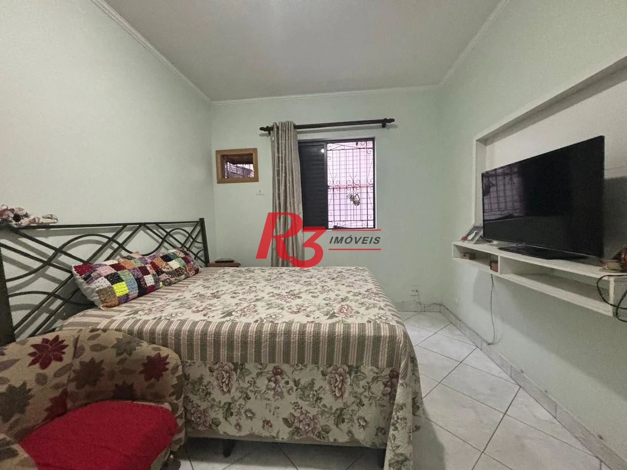 Casa com 3 dormitórios à venda, 127 m² por R$ 890.000,00 - Aparecida - Santos/SP