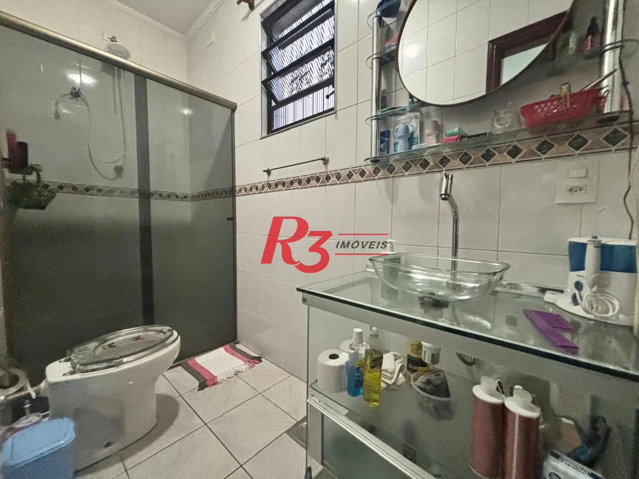 Casa com 3 dormitórios à venda, 127 m² por R$ 890.000,00 - Aparecida - Santos/SP