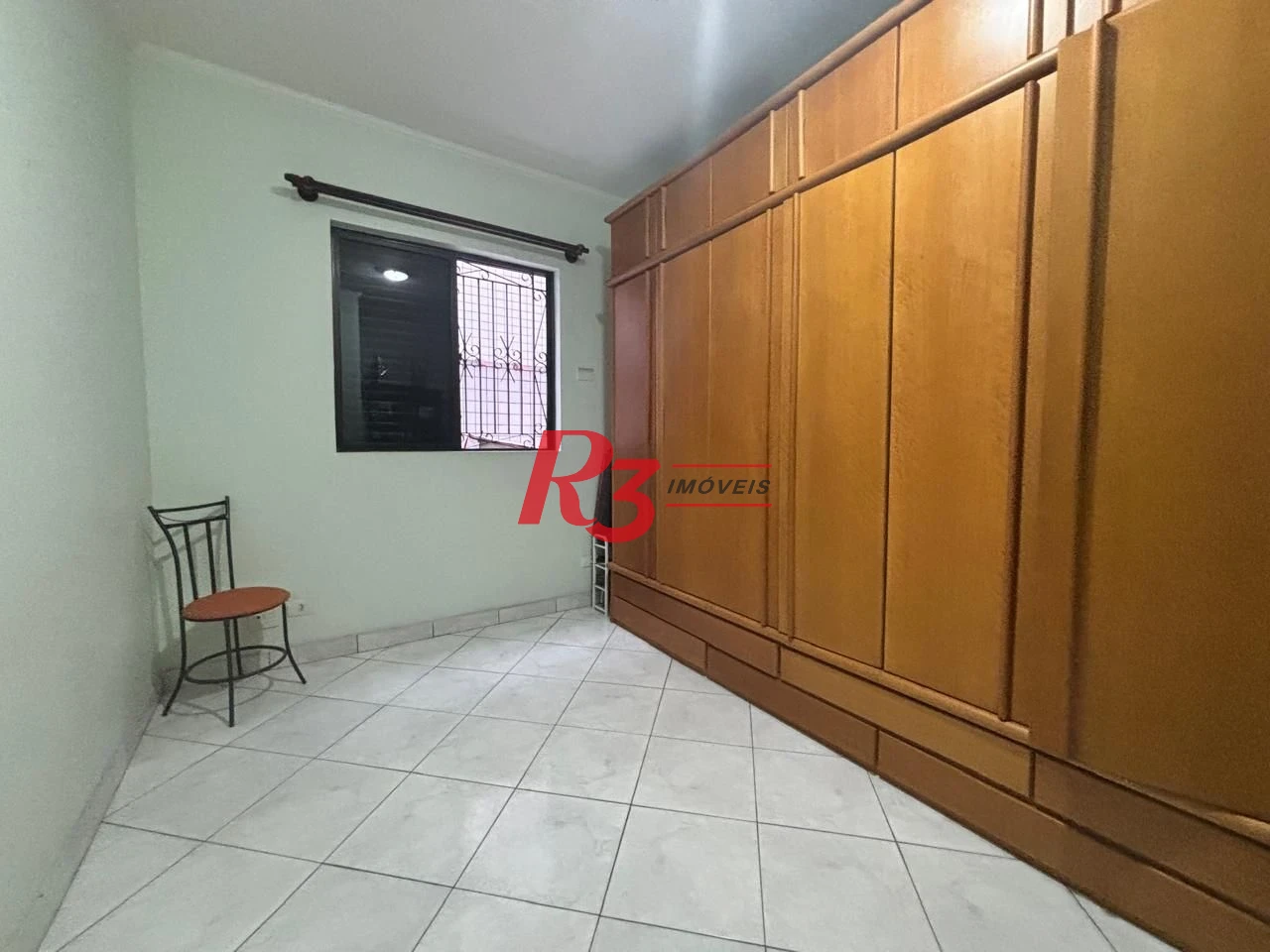 Casa com 3 dormitórios à venda, 127 m² por R$ 890.000,00 - Aparecida - Santos/SP
