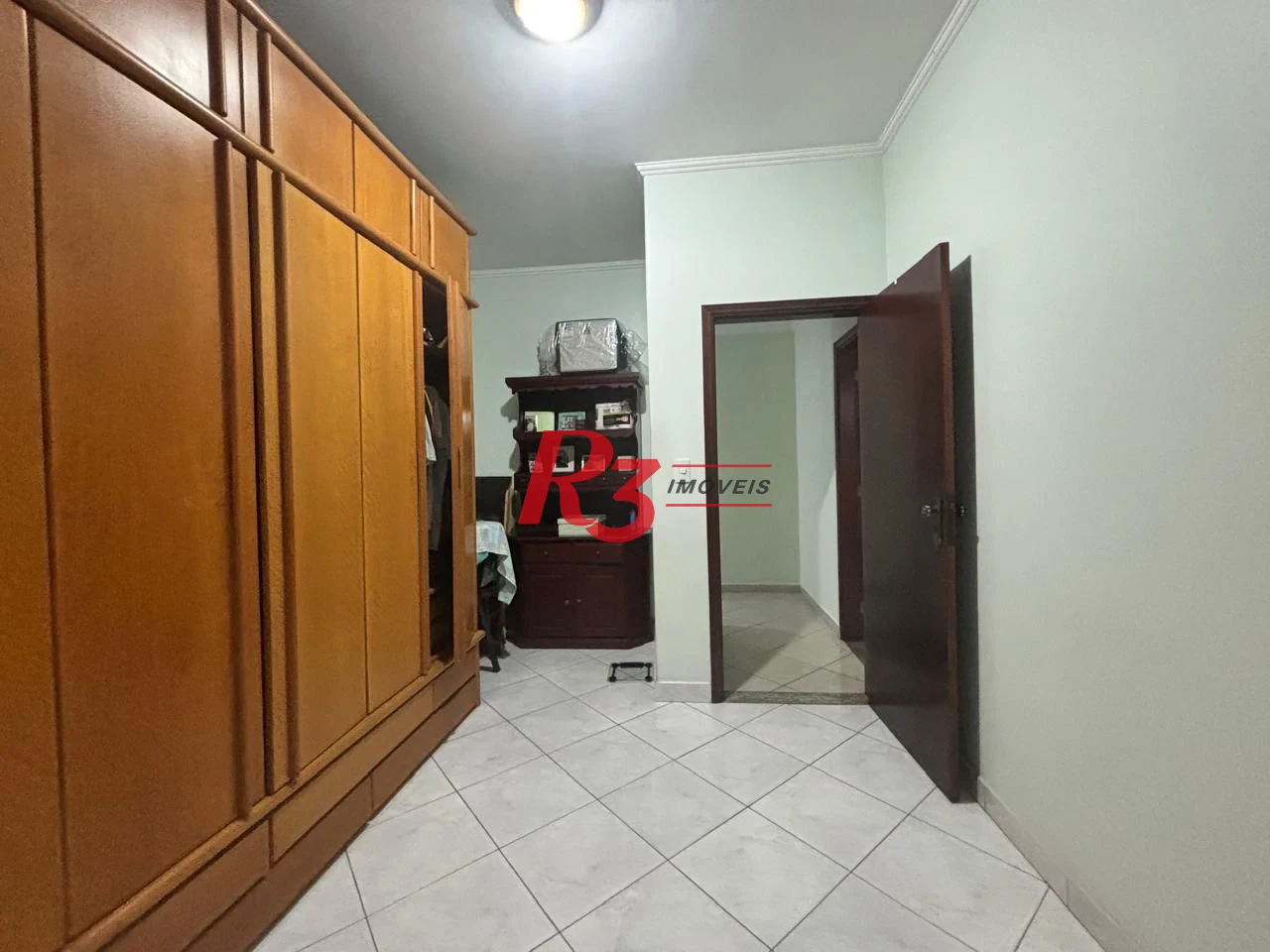 Casa com 3 dormitórios à venda, 127 m² por R$ 890.000,00 - Aparecida - Santos/SP