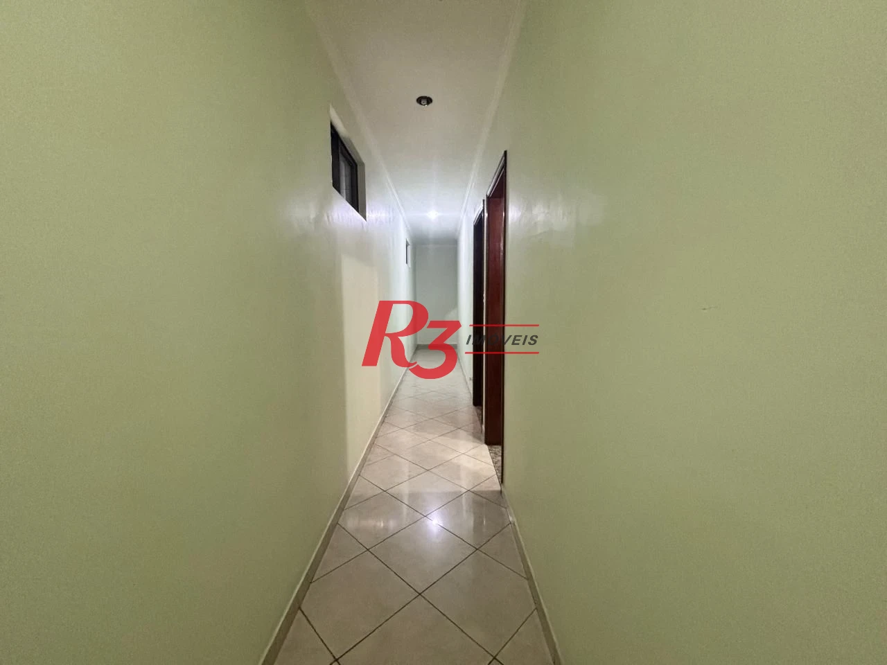 Casa com 3 dormitórios à venda, 127 m² por R$ 890.000,00 - Aparecida - Santos/SP