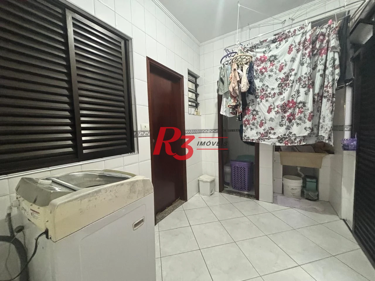 Casa com 3 dormitórios à venda, 127 m² por R$ 890.000,00 - Aparecida - Santos/SP