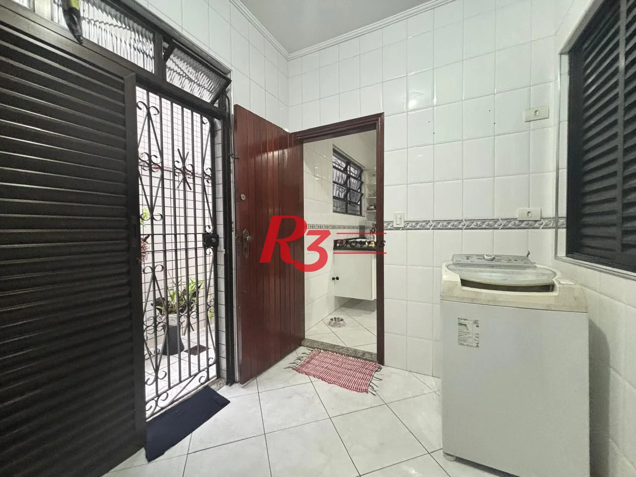 Casa com 3 dormitórios à venda, 127 m² por R$ 890.000,00 - Aparecida - Santos/SP