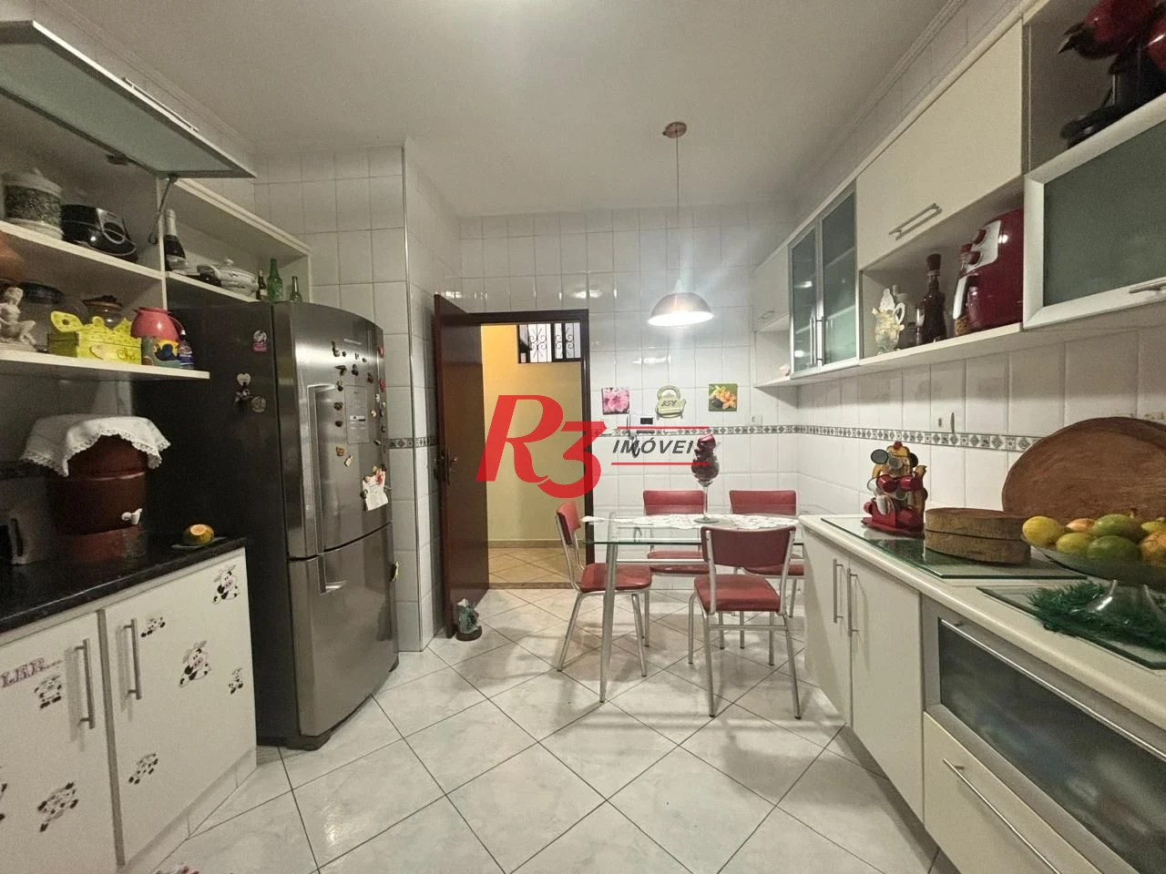 Casa com 3 dormitórios à venda, 127 m² por R$ 890.000,00 - Aparecida - Santos/SP