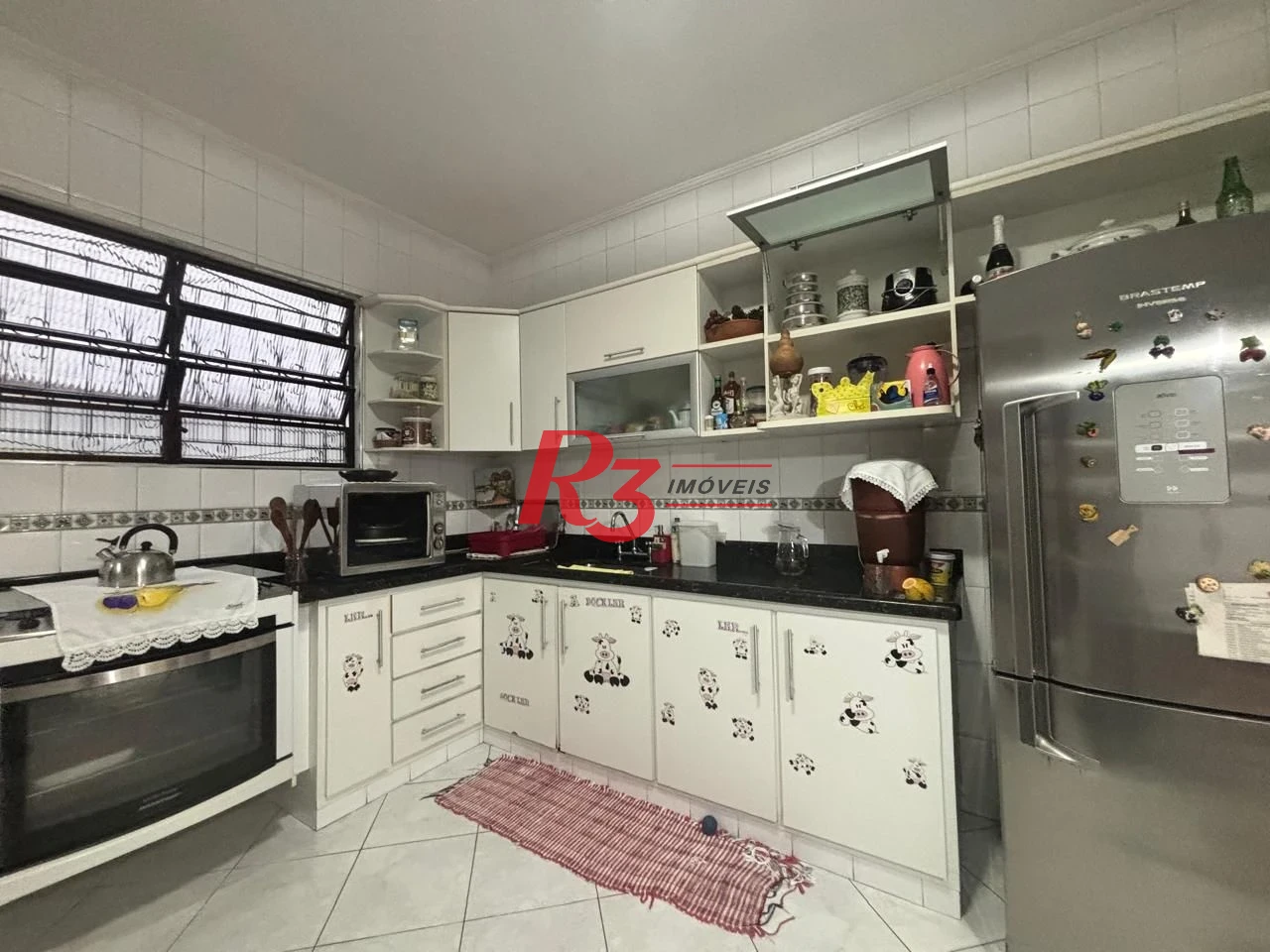Casa com 3 dormitórios à venda, 127 m² por R$ 890.000,00 - Aparecida - Santos/SP