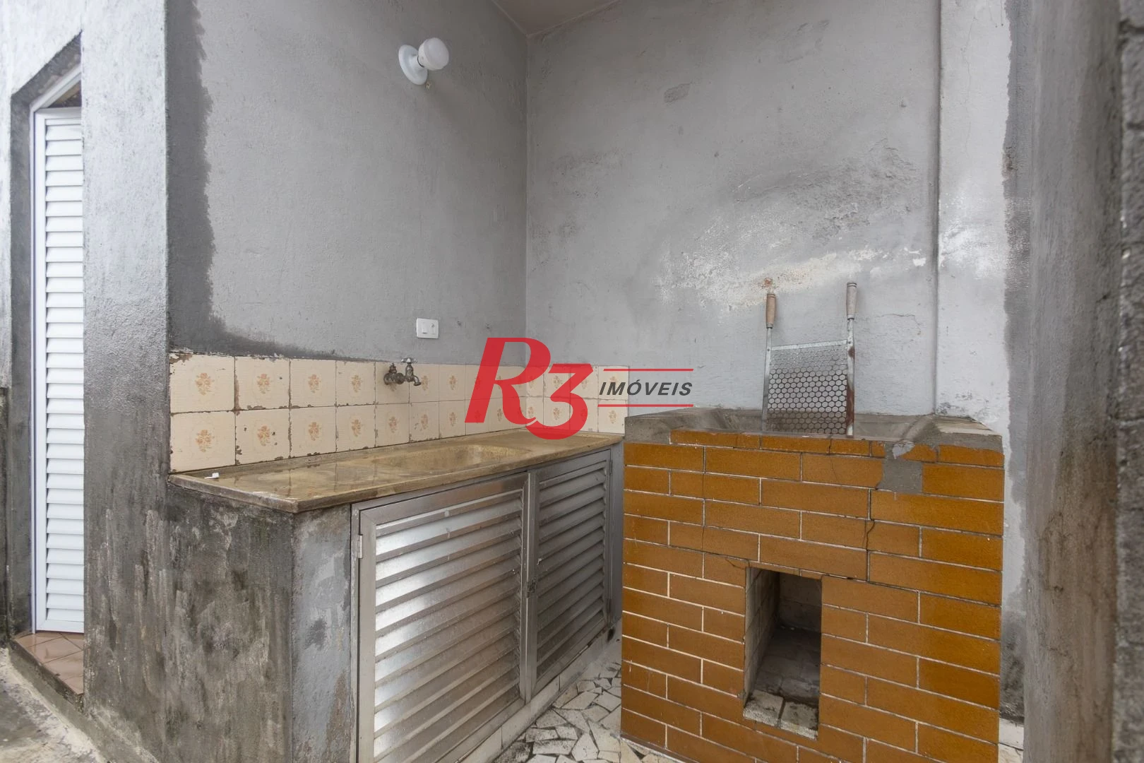 Prédio para alugar, 600 m² - Paquetá - Santos/SP