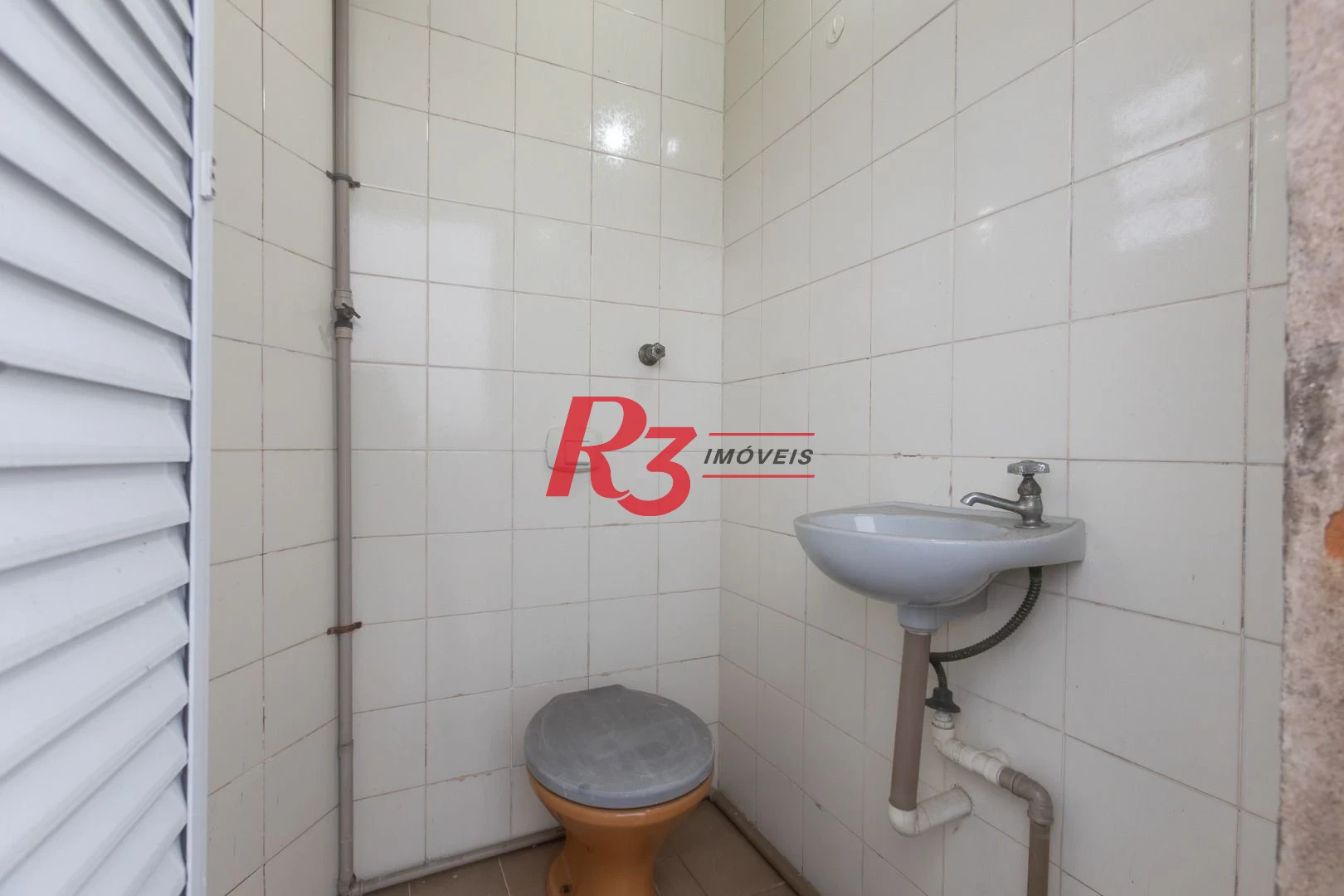 Prédio para alugar, 600 m² - Paquetá - Santos/SP