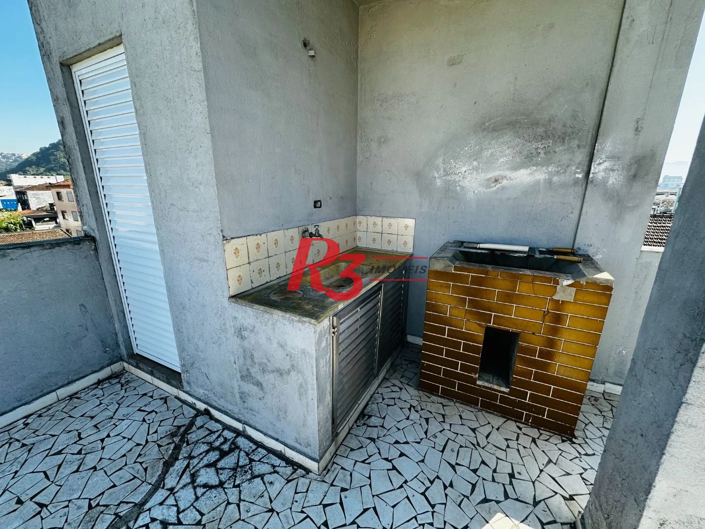Prédio para alugar, 600 m² - Paquetá - Santos/SP