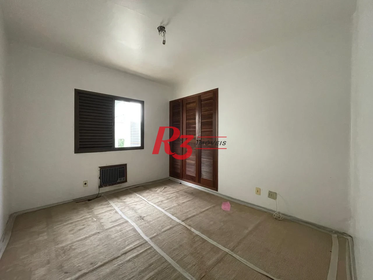 Apartamento com 3 dormitórios à venda, 117 m² por R$ 750.000,00 - Jardim das Conchas - Guarujá/SP