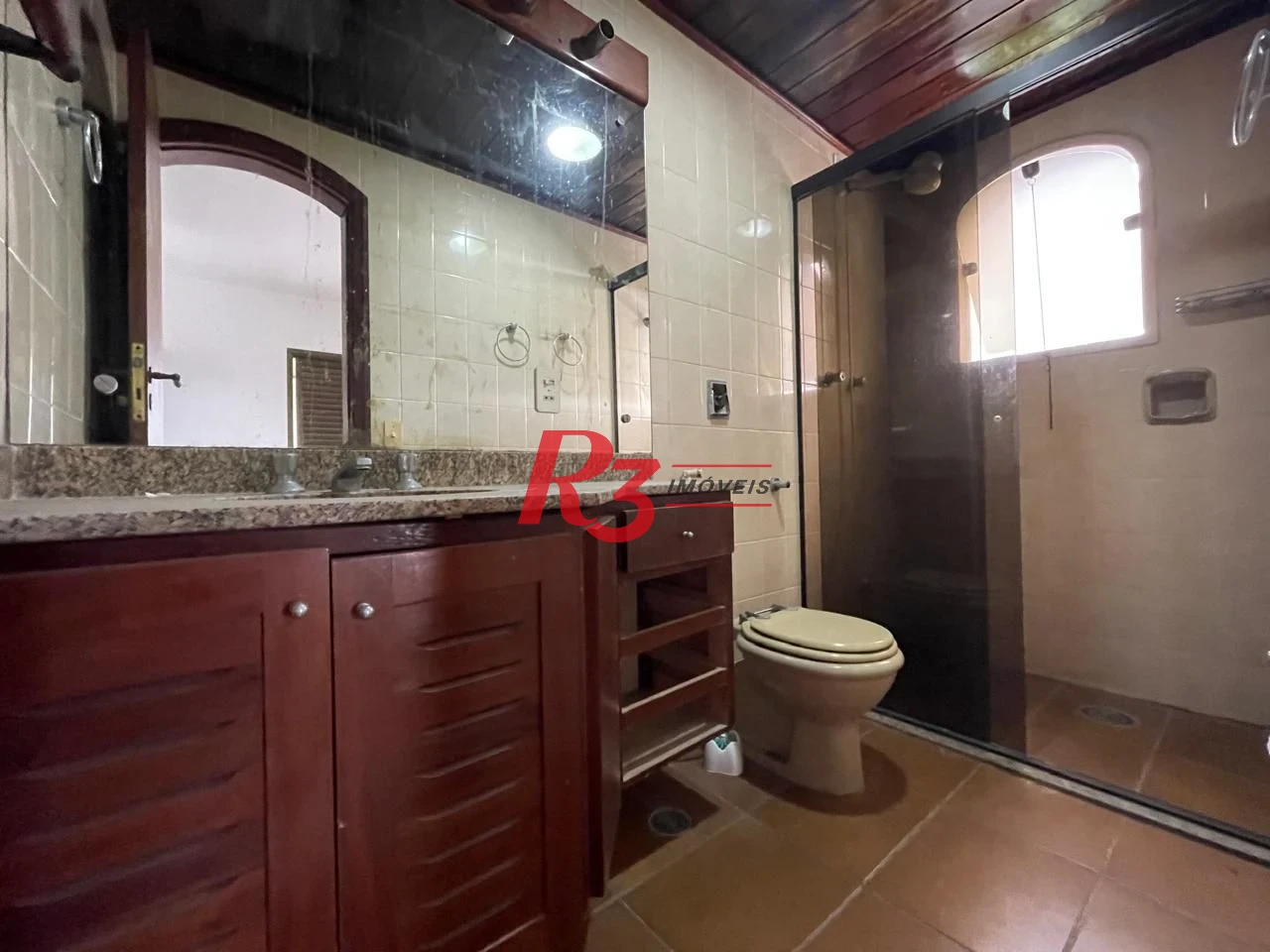 Apartamento com 3 dormitórios à venda, 117 m² por R$ 750.000,00 - Jardim das Conchas - Guarujá/SP