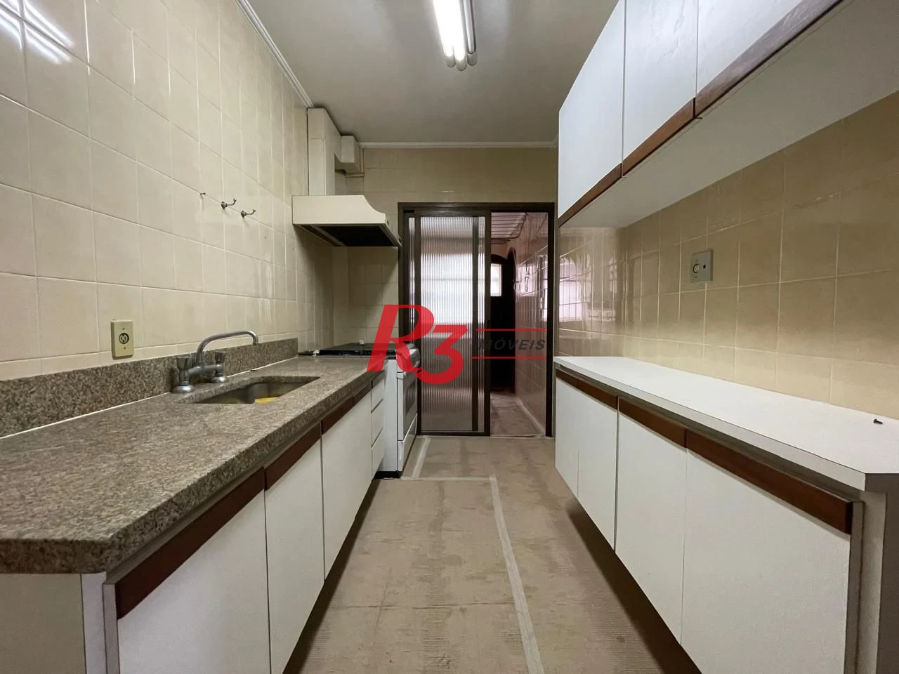 Apartamento com 3 dormitórios à venda, 117 m² por R$ 750.000,00 - Jardim das Conchas - Guarujá/SP