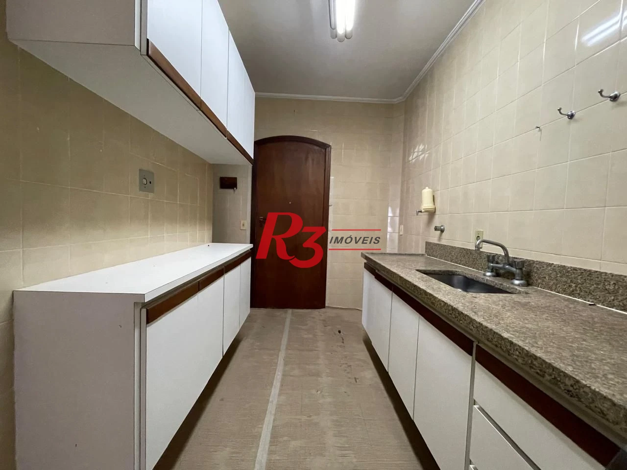 Apartamento com 3 dormitórios à venda, 117 m² por R$ 750.000,00 - Jardim das Conchas - Guarujá/SP