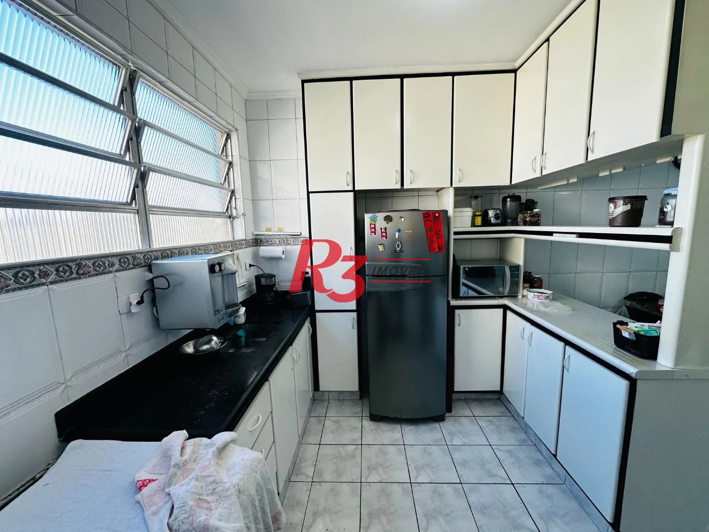 Cobertura com 4 dormitórios à venda, 242 m² por R$ 1.390.000,00 - Gonzaga - Santos/SP
