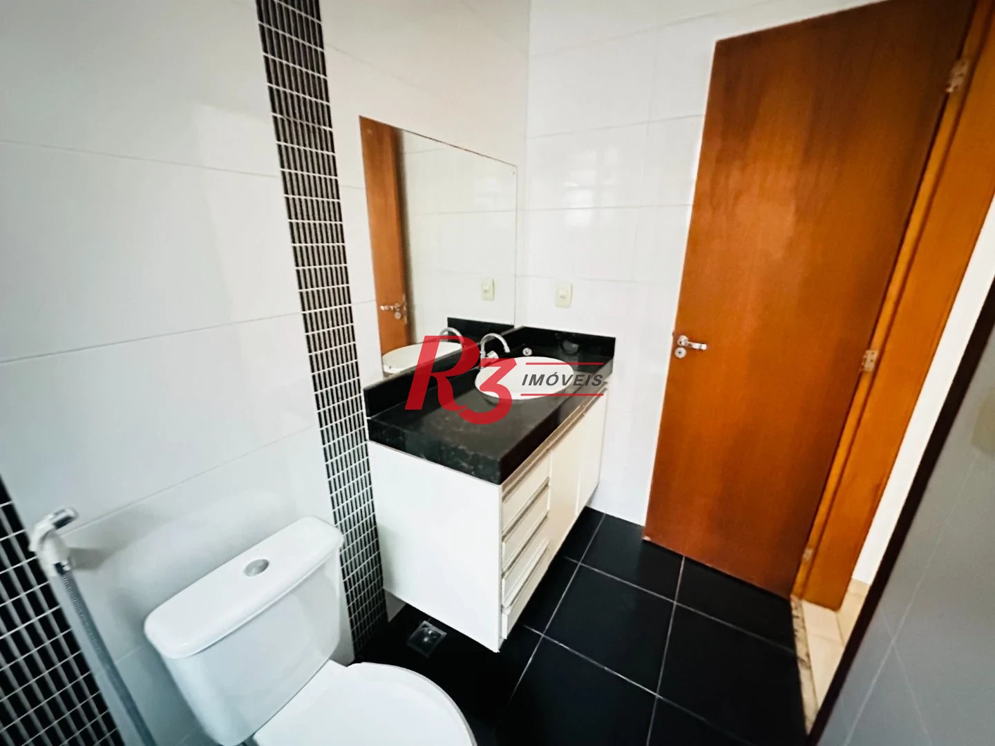 Casa com 3 dormitórios à venda, 120 m² por R$ 1.100.000,00 - Ponta da Praia - Santos/SP