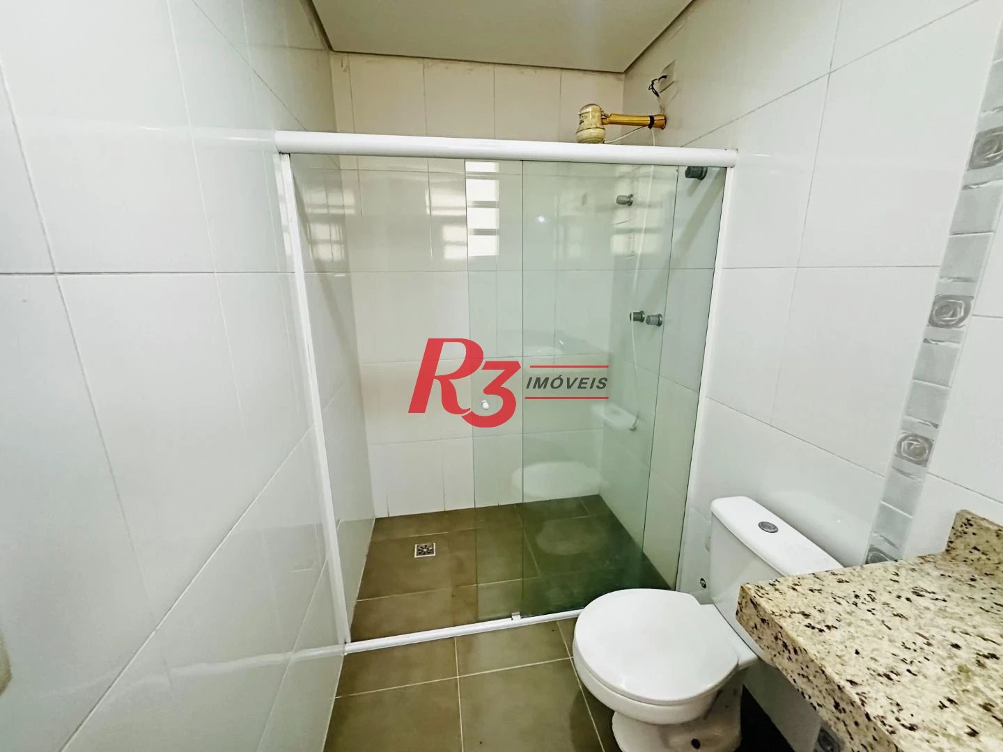 Casa com 3 dormitórios à venda, 120 m² por R$ 1.100.000,00 - Ponta da Praia - Santos/SP