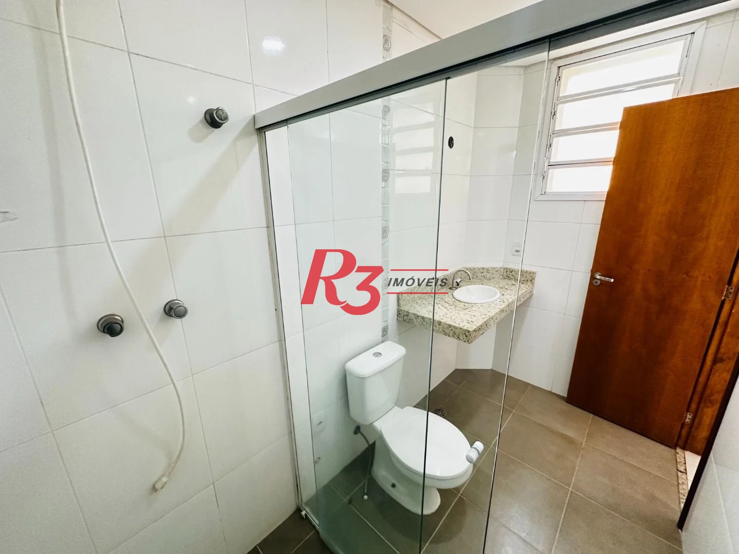 Casa com 3 dormitórios à venda, 120 m² por R$ 1.100.000,00 - Ponta da Praia - Santos/SP