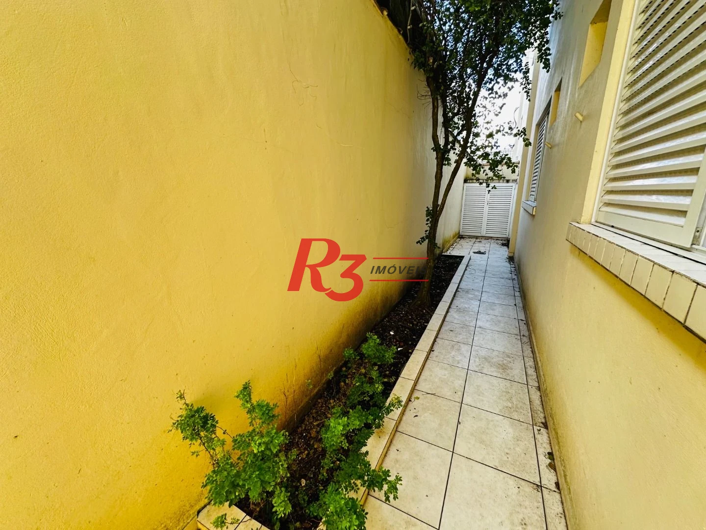 Casa com 3 dormitórios à venda, 120 m² por R$ 1.100.000,00 - Ponta da Praia - Santos/SP
