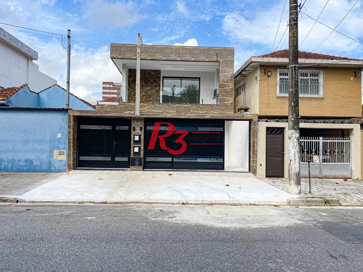 Casa com 3 dormitórios à venda, 150 m² por R$ 1.100.000,00 - Marapé - Santos/SP