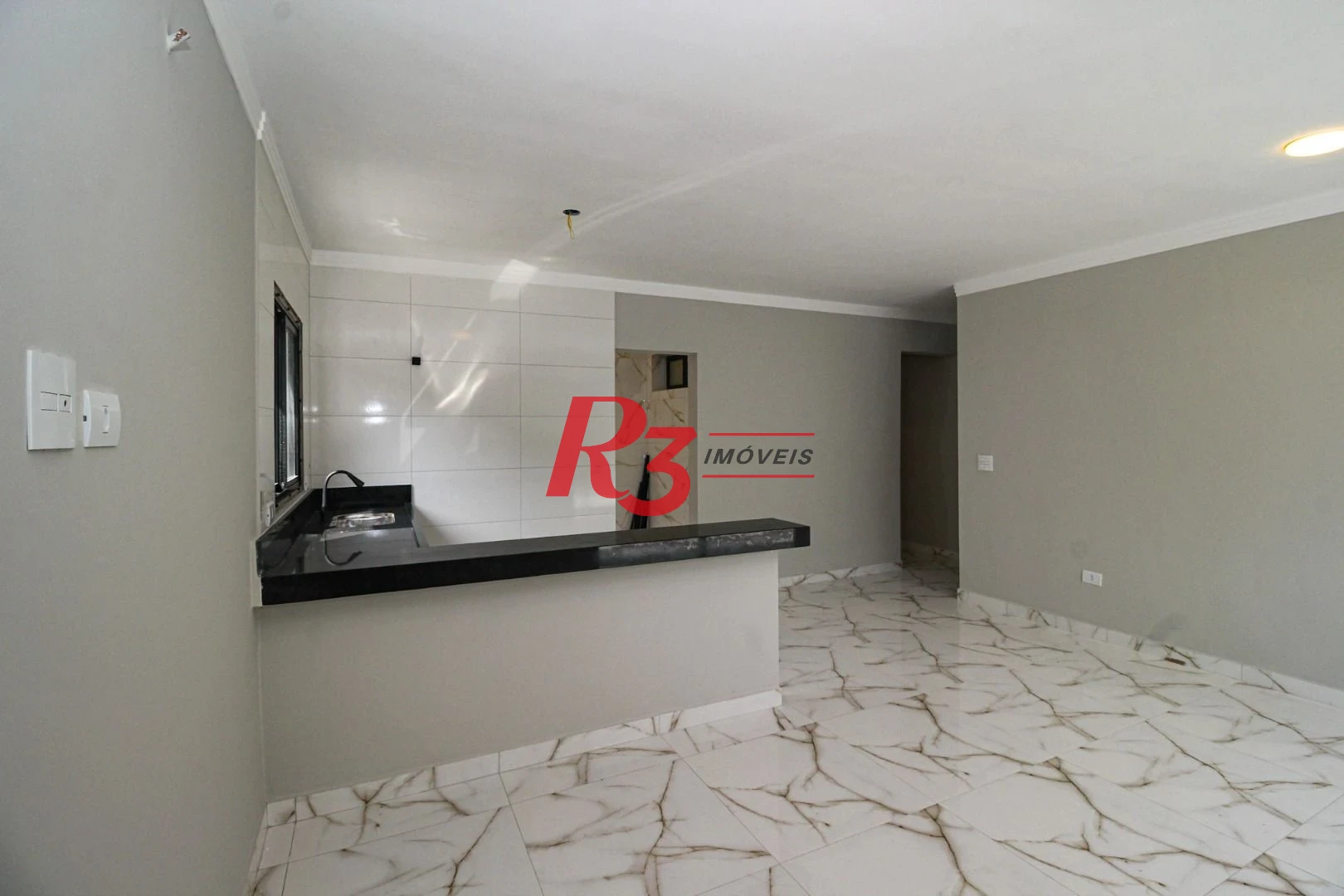 Casa com 3 dormitórios à venda, 150 m² por R$ 1.100.000,00 - Marapé - Santos/SP