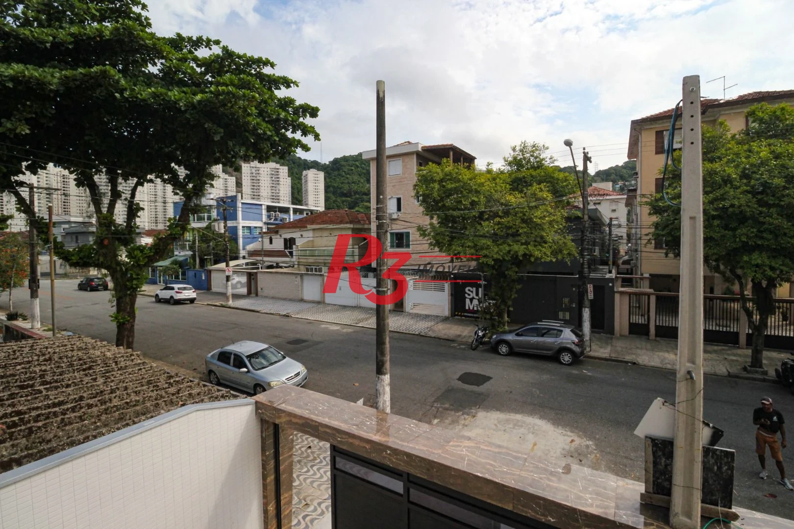 Casa com 3 dormitórios à venda, 150 m² por R$ 1.100.000,00 - Marapé - Santos/SP