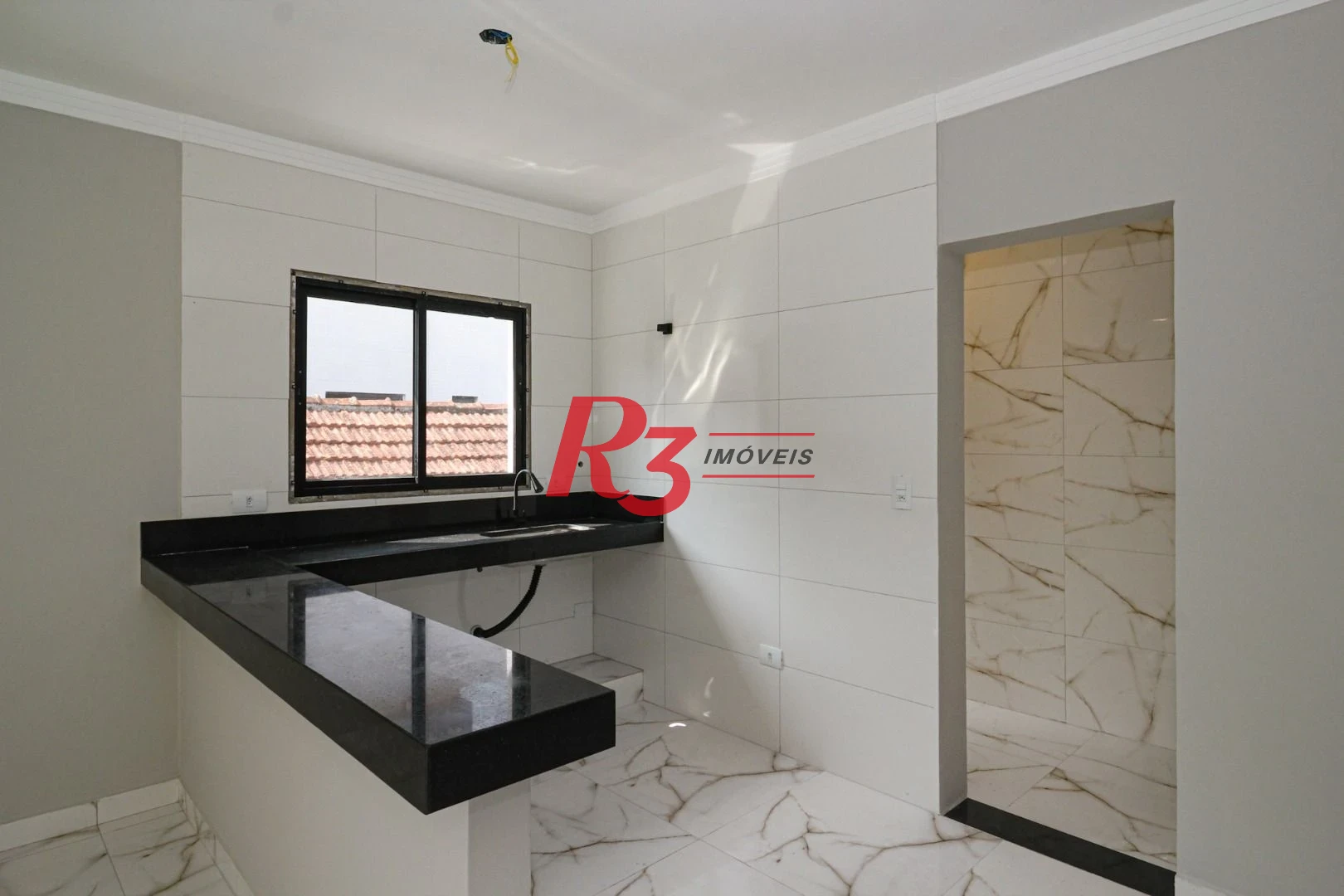 Casa com 3 dormitórios à venda, 150 m² por R$ 1.100.000,00 - Marapé - Santos/SP