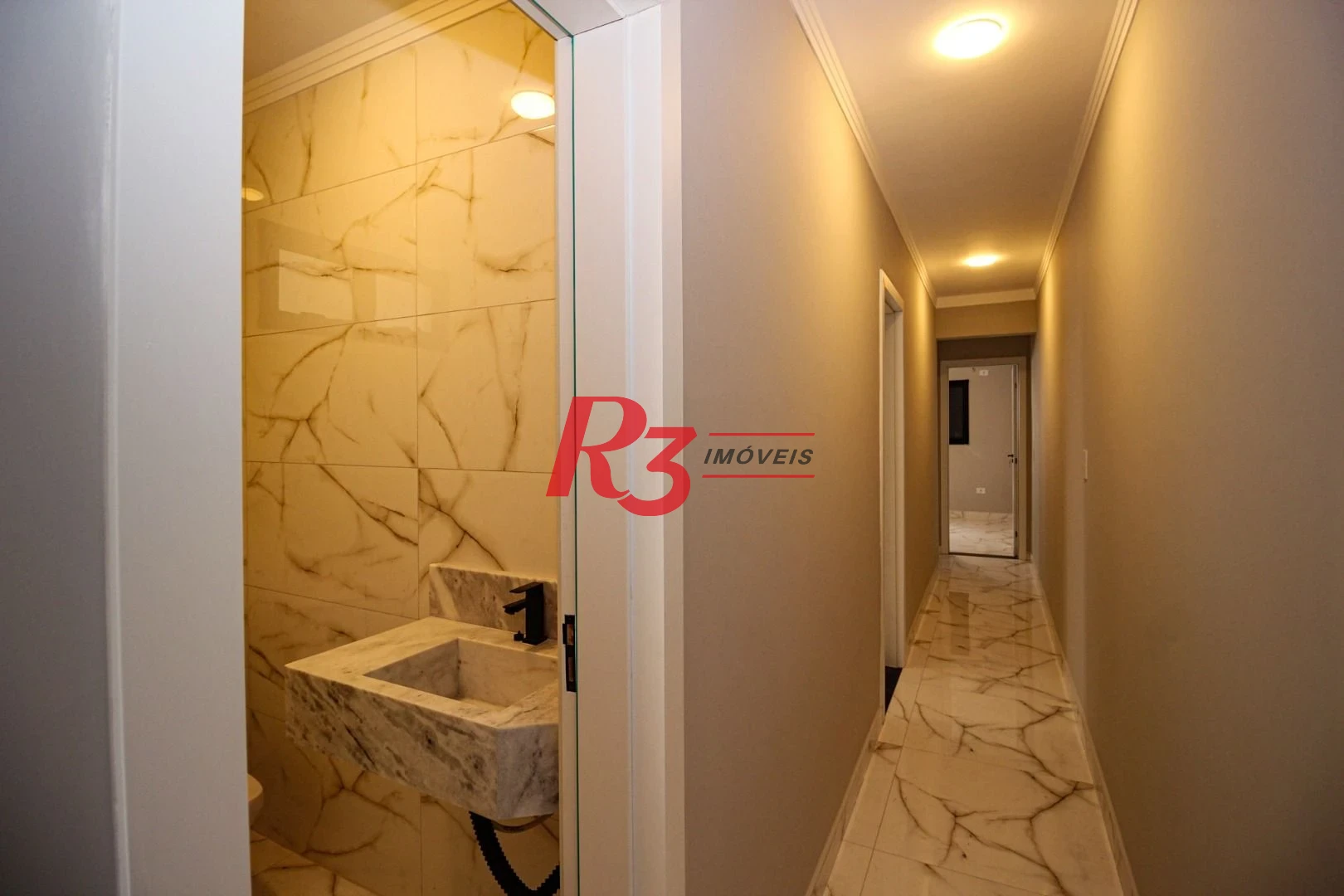 Casa com 3 dormitórios à venda, 150 m² por R$ 1.100.000,00 - Marapé - Santos/SP