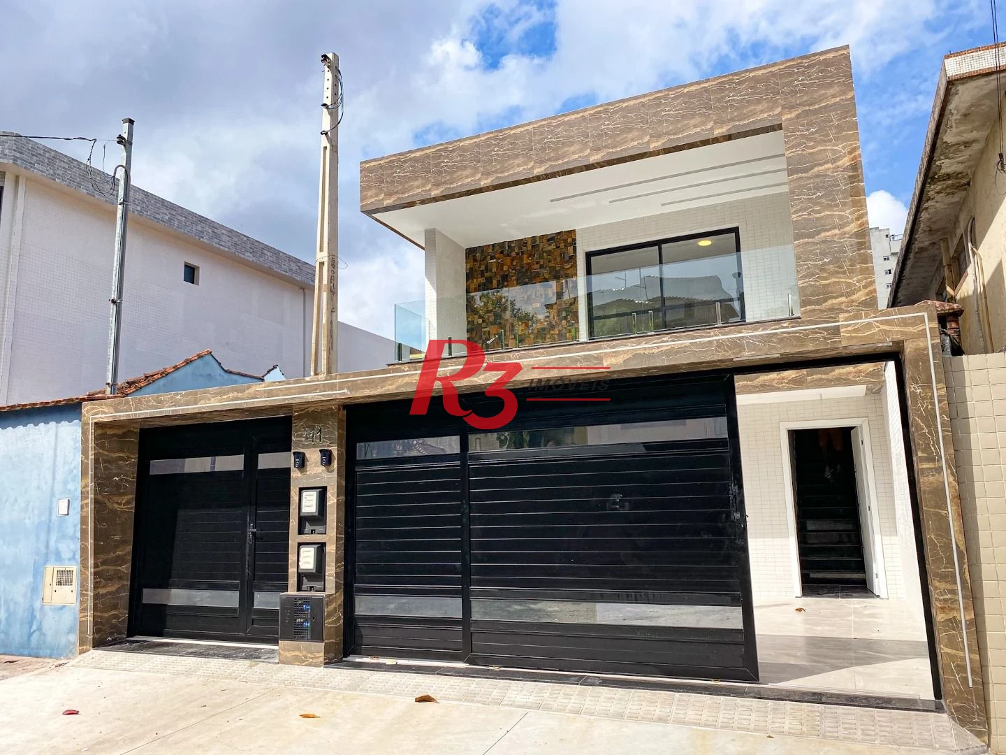 Casa com 3 dormitórios à venda, 150 m² por R$ 1.100.000,00 - Marapé - Santos/SP