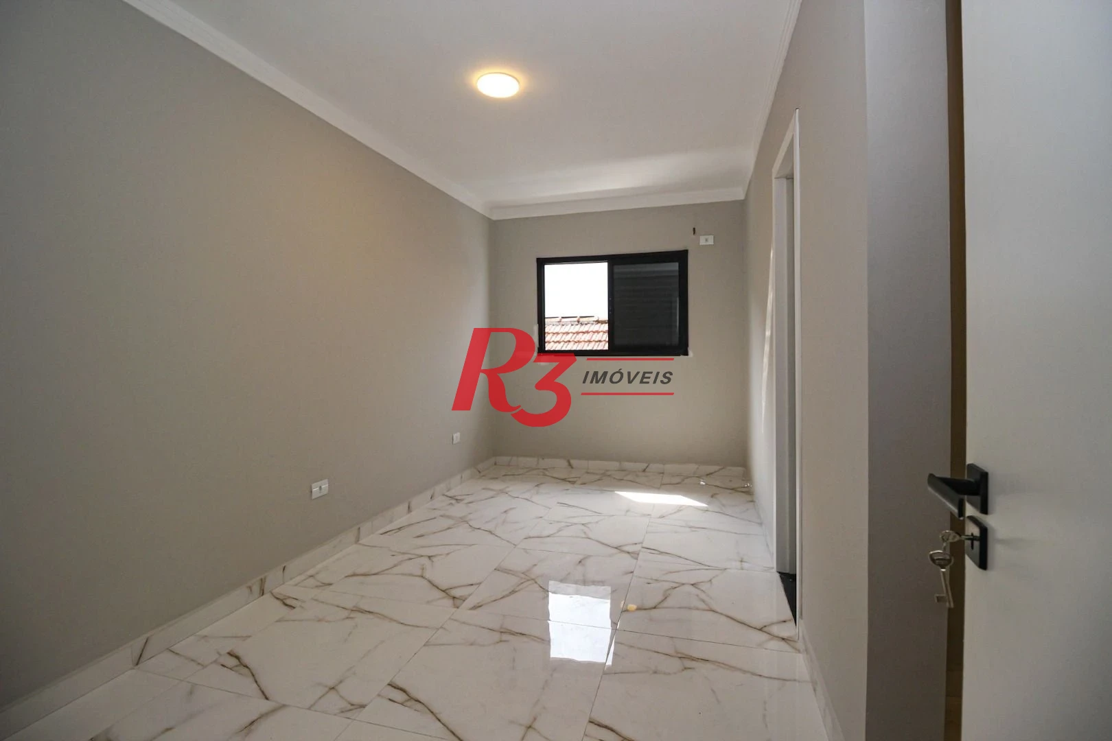 Casa com 3 dormitórios à venda, 150 m² por R$ 1.100.000,00 - Marapé - Santos/SP