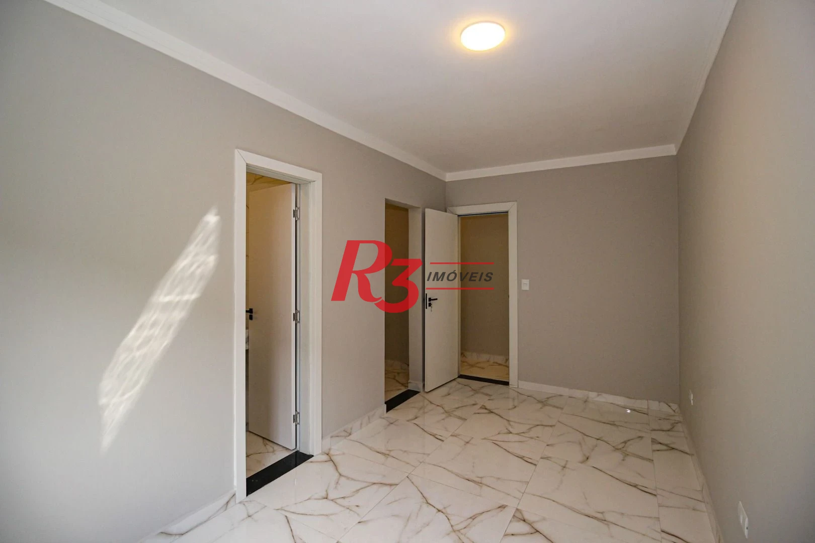 Casa com 3 dormitórios à venda, 150 m² por R$ 1.100.000,00 - Marapé - Santos/SP