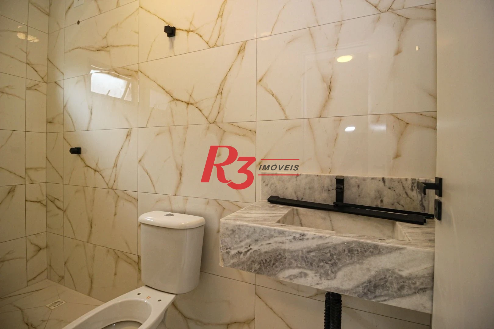 Casa com 3 dormitórios à venda, 150 m² por R$ 1.100.000,00 - Marapé - Santos/SP