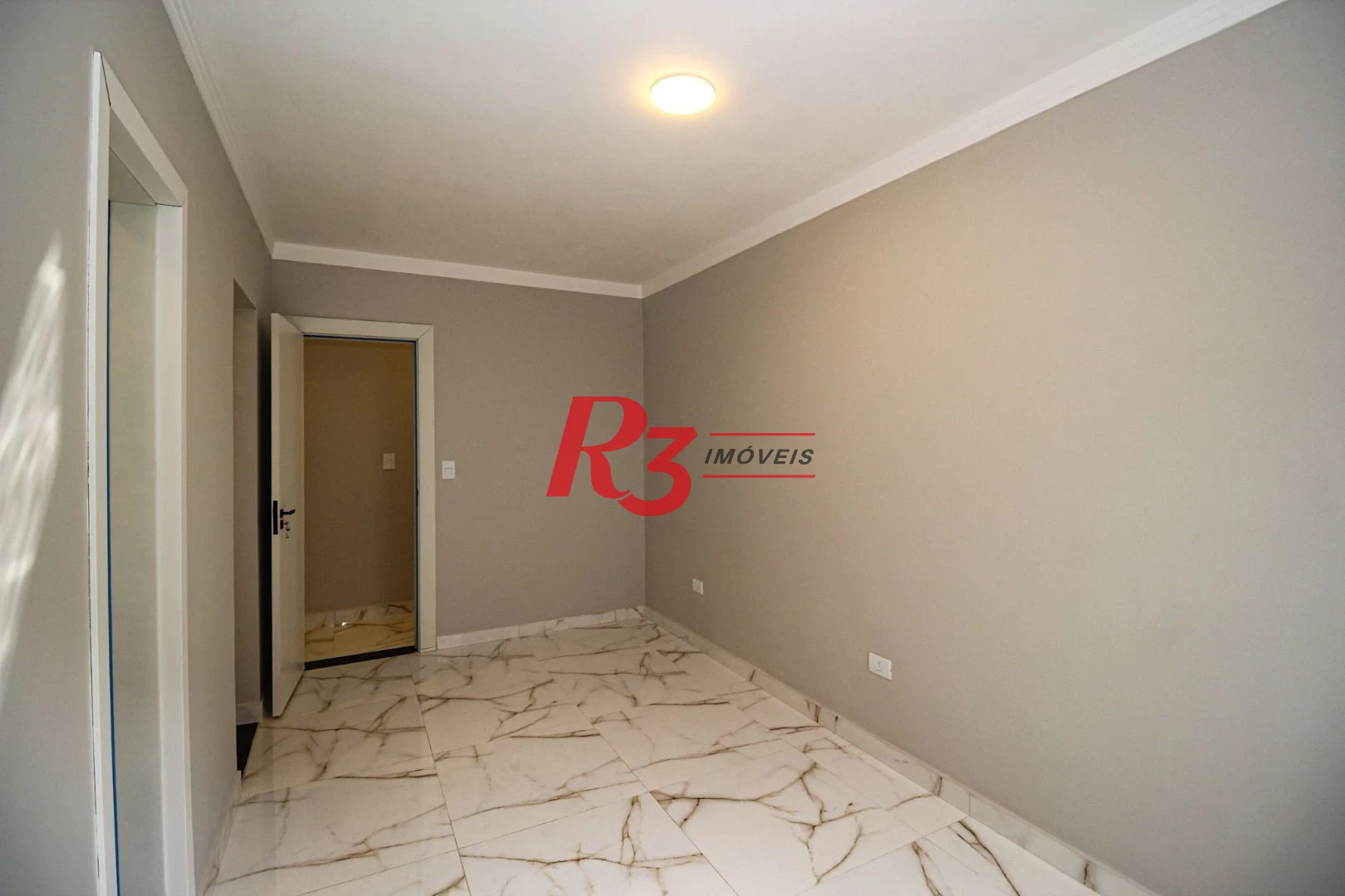 Casa com 3 dormitórios à venda, 150 m² por R$ 1.100.000,00 - Marapé - Santos/SP