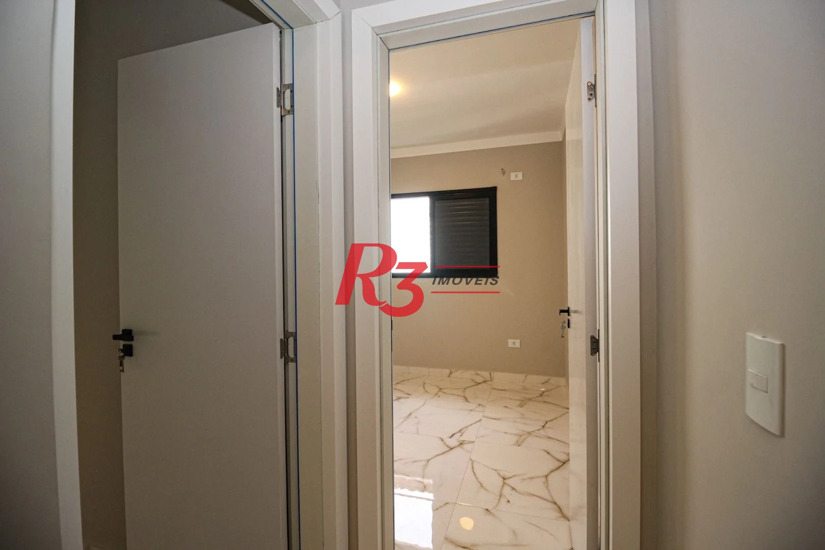 Casa com 3 dormitórios à venda, 150 m² por R$ 1.100.000,00 - Marapé - Santos/SP