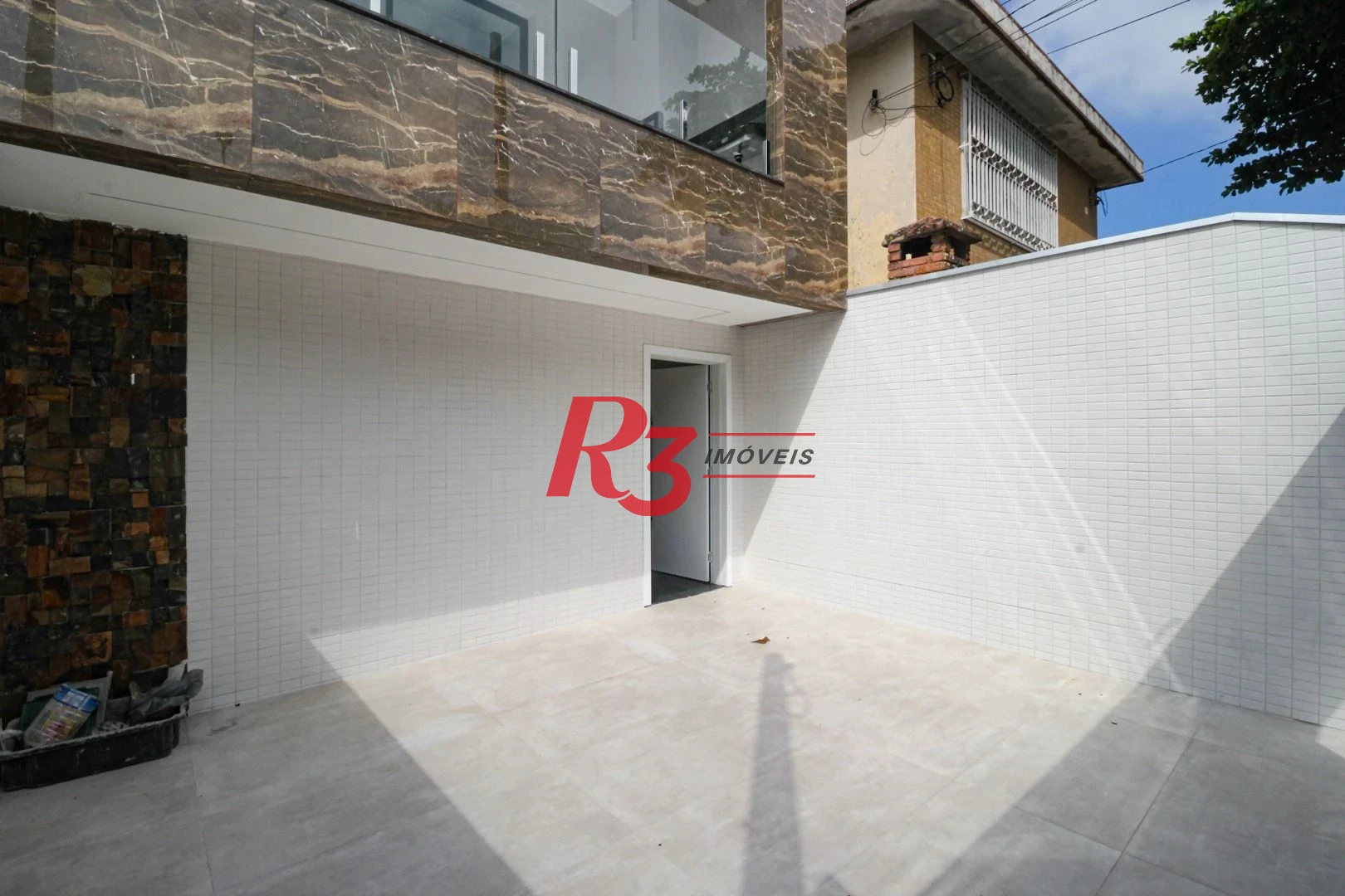 Casa com 3 dormitórios à venda, 150 m² por R$ 1.100.000,00 - Marapé - Santos/SP