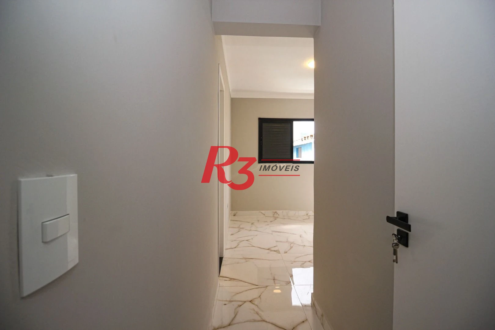 Casa com 3 dormitórios à venda, 150 m² por R$ 1.100.000,00 - Marapé - Santos/SP