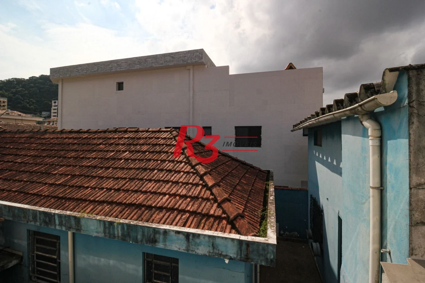 Casa com 3 dormitórios à venda, 150 m² por R$ 1.100.000,00 - Marapé - Santos/SP