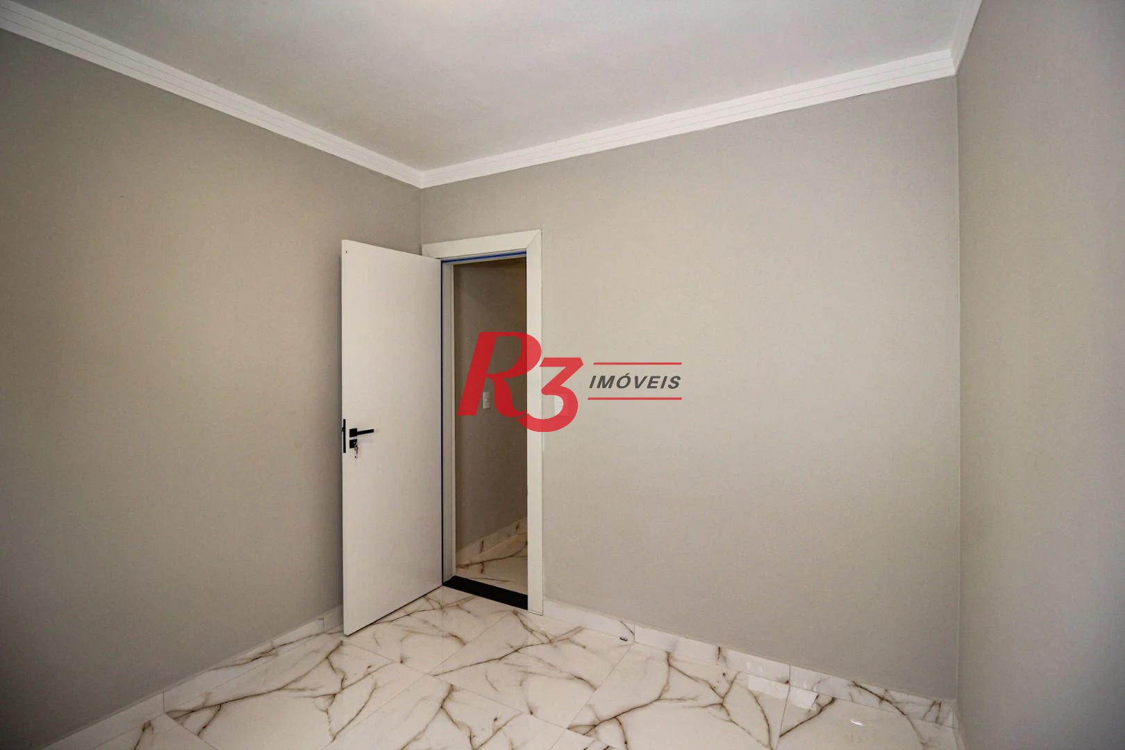 Casa com 3 dormitórios à venda, 150 m² por R$ 1.100.000,00 - Marapé - Santos/SP