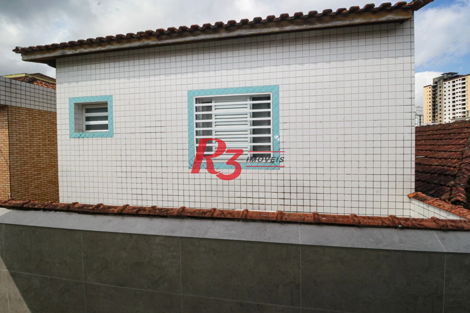 Casa com 3 dormitórios à venda, 150 m² por R$ 1.100.000,00 - Marapé - Santos/SP