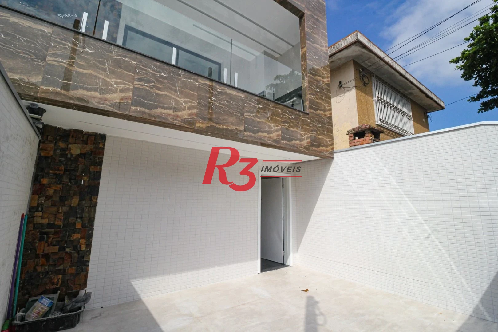 Casa com 3 dormitórios à venda, 150 m² por R$ 1.100.000,00 - Marapé - Santos/SP