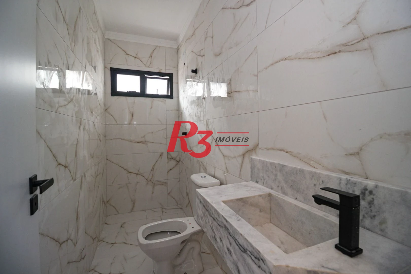 Casa com 3 dormitórios à venda, 150 m² por R$ 1.100.000,00 - Marapé - Santos/SP
