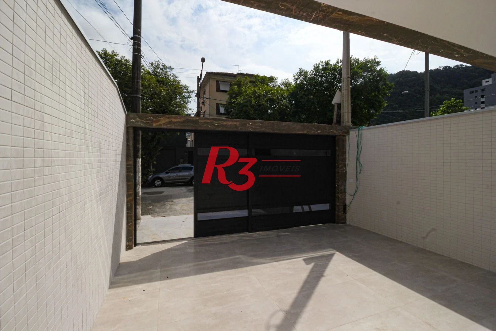 Casa com 3 dormitórios à venda, 150 m² por R$ 1.100.000,00 - Marapé - Santos/SP