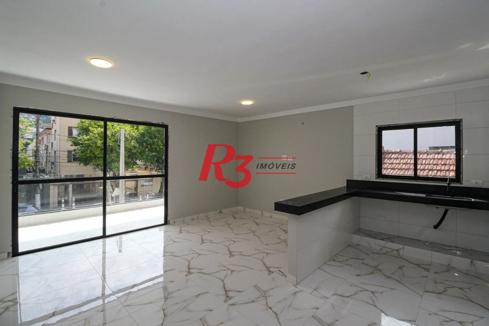 Casa com 3 dormitórios à venda, 150 m² por R$ 1.100.000,00 - Marapé - Santos/SP