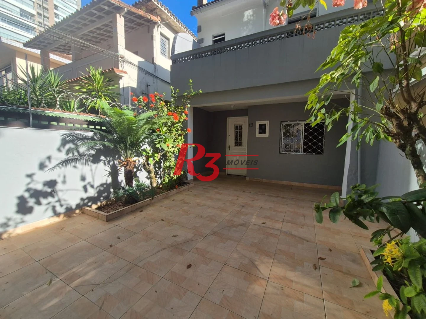 Sobrado com 3 dormitórios à venda, 151 m² por R$ 1.700.000,00 - Pompéia - Santos/SP