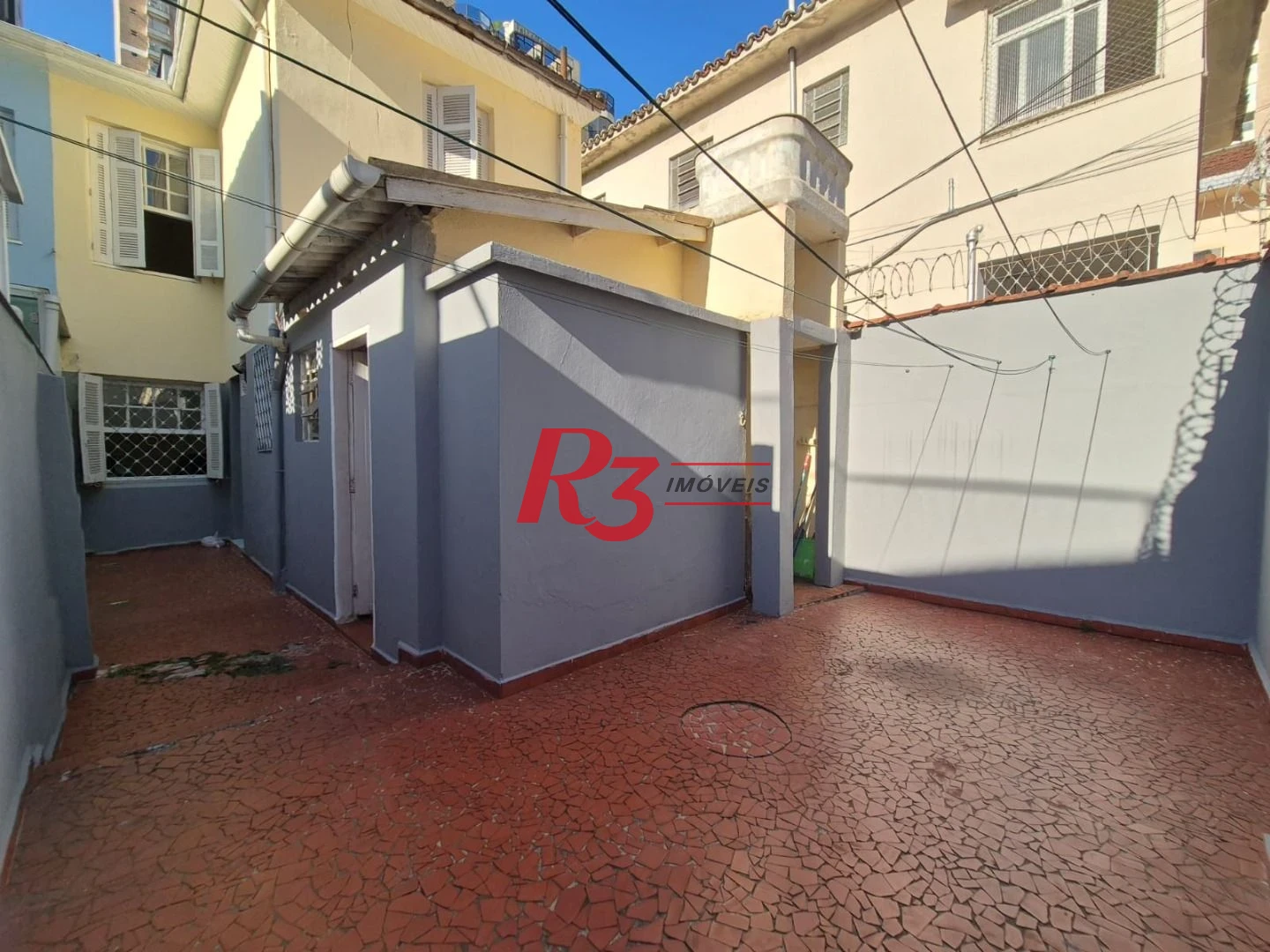 Sobrado com 3 dormitórios à venda, 151 m² por R$ 1.700.000,00 - Pompéia - Santos/SP